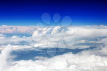 Beautiful view above the earth at the clouds below.