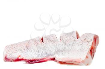 Slices of raw carp  on a white background.Isolated