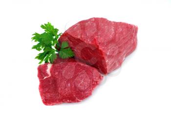 Cut of  beef steak with green leaf. Isolated.