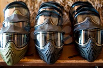 Paintball masks in a row