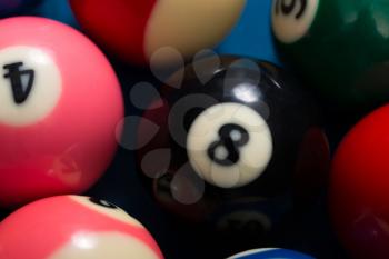 Close-Up Of Pool Balls On Blue Pool Table