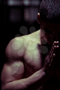 Muscular Man Praying