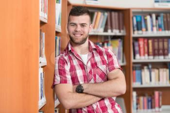 Portrait Of Clever Caucasian Student In College Library - Shallow Depth Of Field