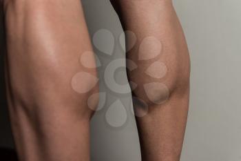 Bodybuilder Doing Heavy Weight Exercise For Legs Calves Close Up