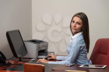 Young Pretty Business Woman With Notebook In The Office - Successful Businesswoman At Work