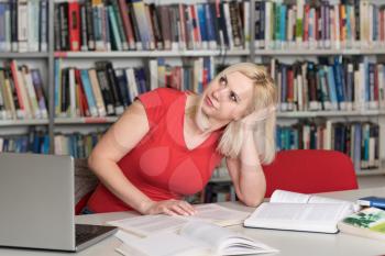 Young Woman Student Feel Bored While Trying to Studying Entry Exams to University or College