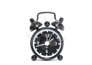 Black alarm clock isolated on white background