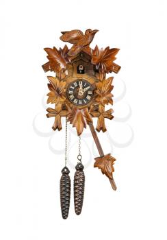 Crafted wooden made cuckoo clock with birdie out of house at 2 O'Clock position with arm in swing motion on white background  