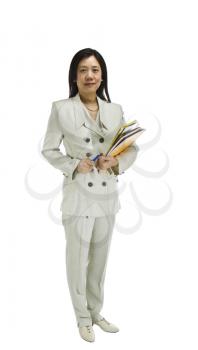 Asian woman dressed in business formal white outfit while holding notepads and pen on white background