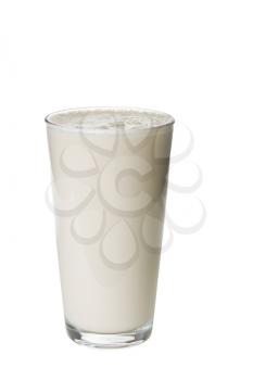 Full glass of vanilla soybean milk on white background