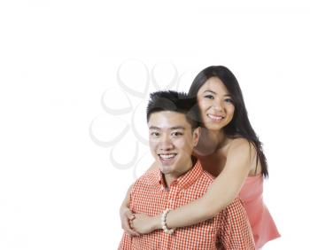 Photo of young adult couple displaying happiness on white background 