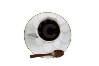 Closeup top view photo of black coffee, in small cup, milk chocolate spoon with saucer underneath isolated on white 