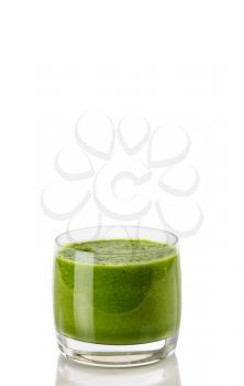 Glass filled with fresh organic smoothie made with vegetables and fruit isolated on white background 