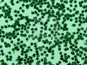 Saint Patricks Day with shamrocks on green background in filled frame format 