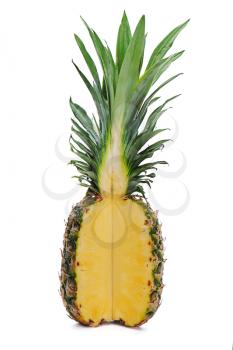 ripe whole pineapple with a quarter cut isolated on white background