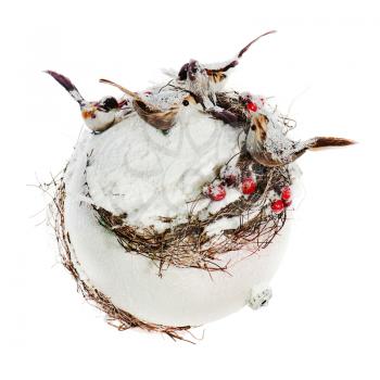 New Year's composition from birds, mountain ashes, snow and a white sphere isolated on white background