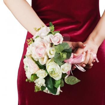 Beautiful wedding bouquet from white and pink roses in hands of bride.