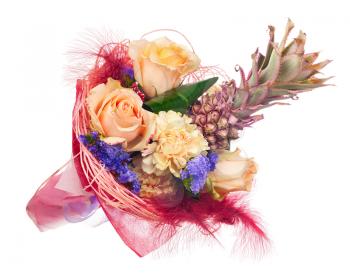 Beautiful bouquet of roses, carnations, decorative pineapple and other flowers in red  package isolated on white background.