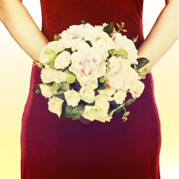 Beautiful wedding bouquet from white and pink roses with retro filter effect. Closeup.