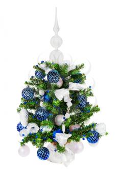 Christmas fir tree decorated with Christmas balls, snowflakes, candles, beads and pine branches isolated on white background.