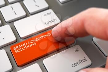 Finger Pushing Brand Advertising Solutions Orange Button on Laptop Keyboard. 3D Illustration.