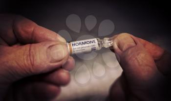 Injection of Hormone Ampoule in a Hands of an Old Man. Healthcare Pharmacy Treatment Concept. Close Up View.