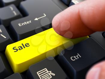 Sale Concept. Person Click on Yellow Keyboard Button. Selective Focus. Closeup View.