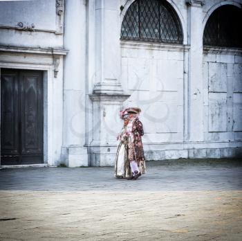 people in carnival costume on place of Venice, Italy 2019