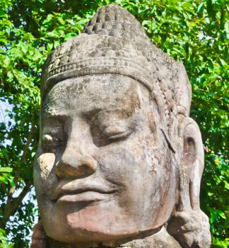 Stone face in Angkor Wat Area, near Siem Reap, Cambodia, Southeast Asia