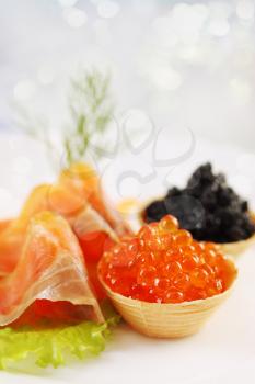 Waffle baskets with caviar and smoked salmon