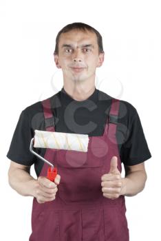 Royalty Free Photo of a Man With a Paint Roller