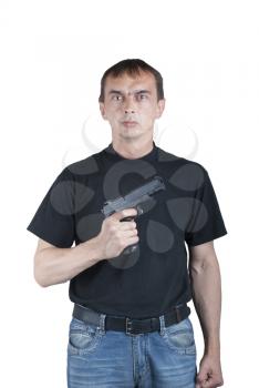 Royalty Free Photo of a Man With a Gun in His Hand