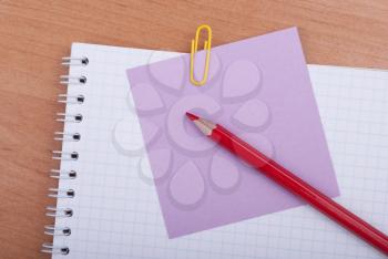 Royalty Free Photo of a Notebook, Paper and Pencil