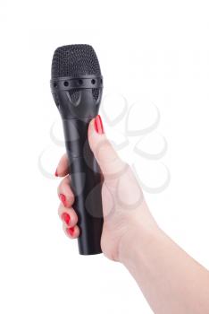 Female hand with a microphone.