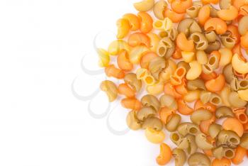 Pasta is scattered on a white background.