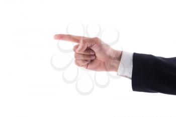 Businessman hand pointing to the left index finger on a white background.