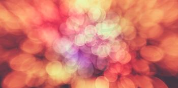 Abstract Colorful Background With Warm Orange, Red, Yellow Colors. Bokeh Lights Out Of Focus.