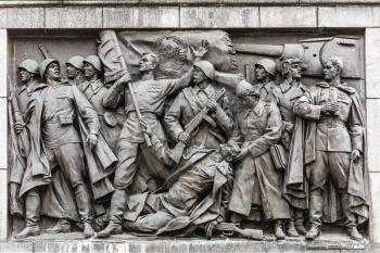Bas-relief Scenes On The Wall Of The Stele Dedicated To The Memory Of The Great Patriotic War. Victory Square - Symbol Belarusian Capital, Minsk, Belarus