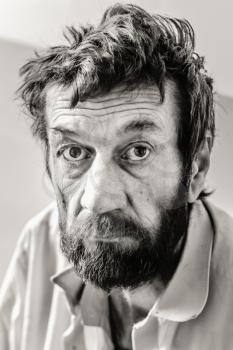 Serious Sad Old Adult Man With Beard In Black And White Colors