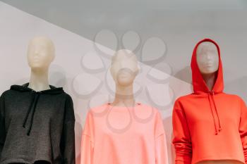Close View Of Mannequins Dressed In Female Woman Casual Clothes In Store Of Shopping Center.