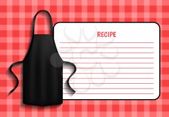 Black apron next to piece of paper with recipe. Clothes for work in kitchen, protective element of clothing for cooking. Apron for cooking in kitchen and protection of clothes near recipe of dish