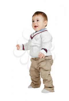 A healthy child learns to walk. isolated on white