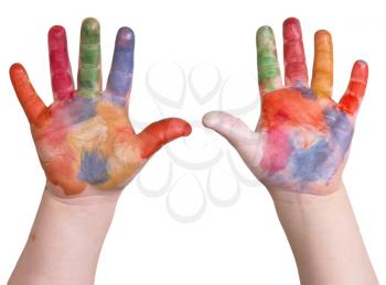 child is holding up painted art hands on a white isolated background.