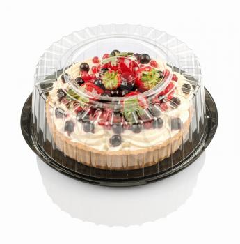 tartlet with cream and fruit isolated on a white background with clipping path