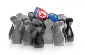 One unique pawn on top of common pawns, flag of North Korea