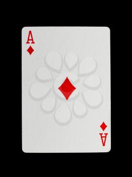 Old playing card (ace) isolated on a black background