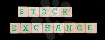 Letters on wooden blocks (stock, exchange)