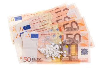 White pills on some 50 euro banknotes