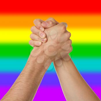 Man and woman in arm wrestlin, white background, rainbow flag pattern