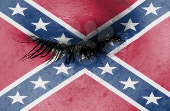 Crying woman, pain and grief concept, confederate flag